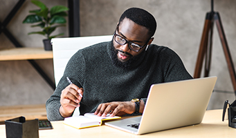 man working on laptop