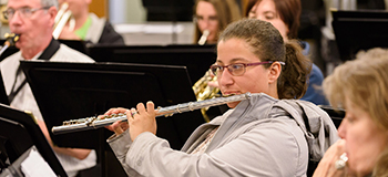 girl playing flute