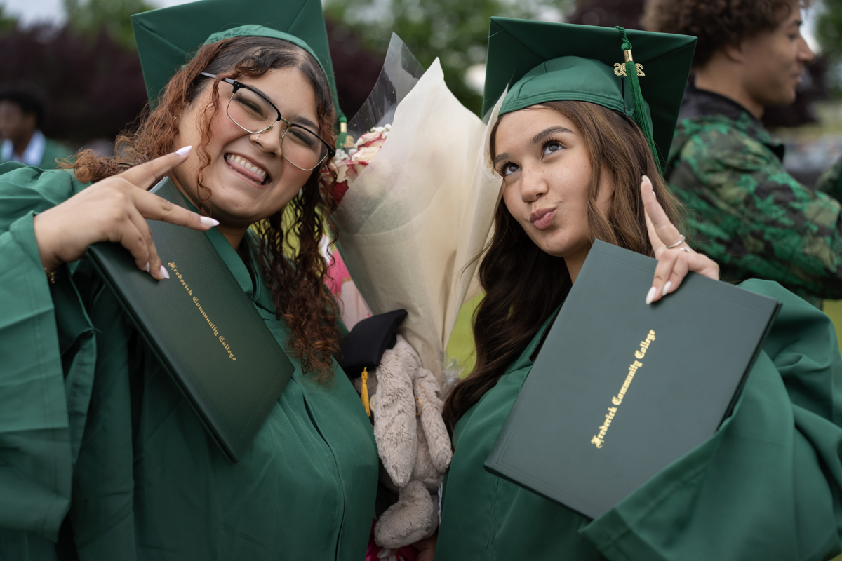 A close-up of a graduate's face filled with emotion during a speech