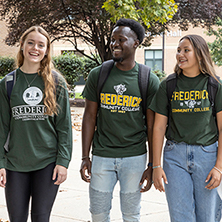 3 students in FCC shirts