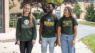 3 students in FCC shirts