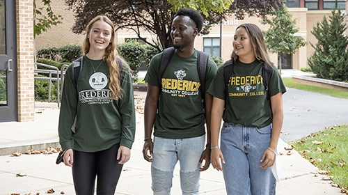 3 students in FCC shirts
