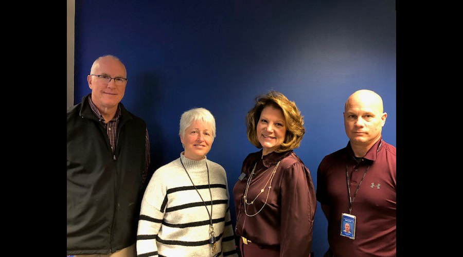 Photo includes: Chris Sasse (Faculty Member), Didi Culp (Program Manager), Kathy Francis (Executive Director), and John Packard 