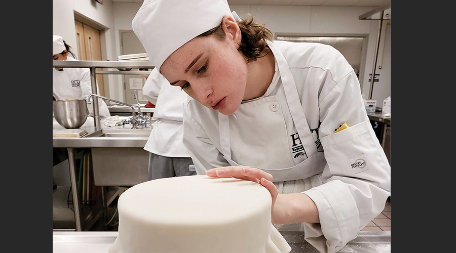 Baker icing cake