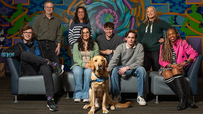 Group of people and dog in Mosaic Center