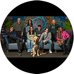 Group of people and dog in Mosaic Center
