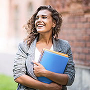 Girl holding notebooks