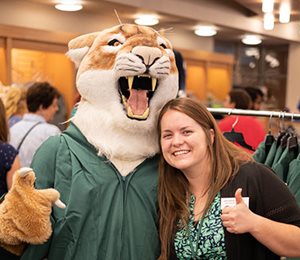Jen Moxley poses with Freddie Cougar